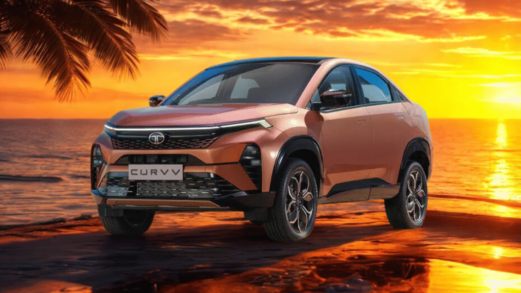 Tata Curvv parked on a rooftop helipad against a backdrop of golden city lights, reflecting urban luxury and bold styling.
