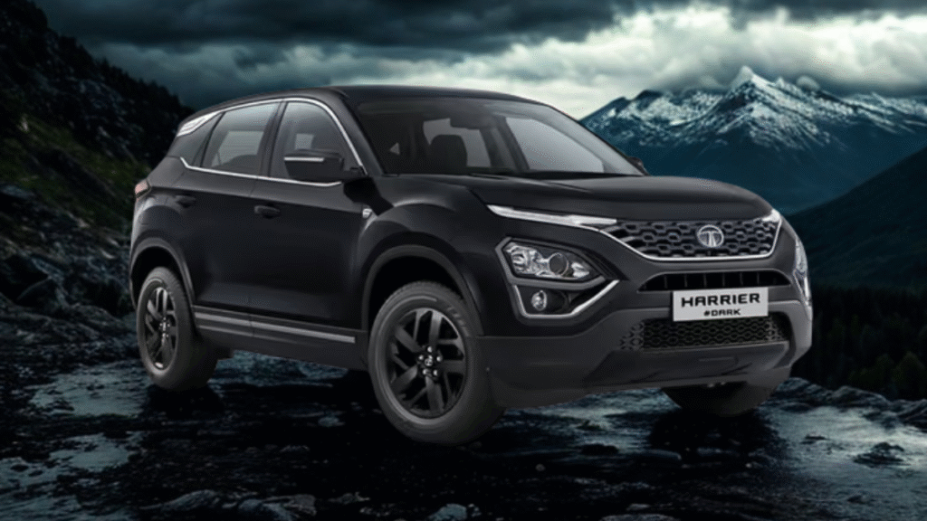 Tata Harrier Dark Edition parked in neon-lit futuristic cityscape at night with reflections on wet asphalt and dramatic shadows