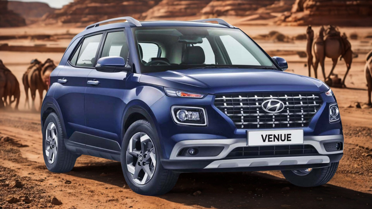 Hyundai Venue driving through the deserts of Rajasthan with camels and sand dunes in the background.