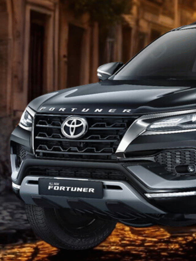 Toyota Fortuner petrol and diesel models side by side with a city and highway background