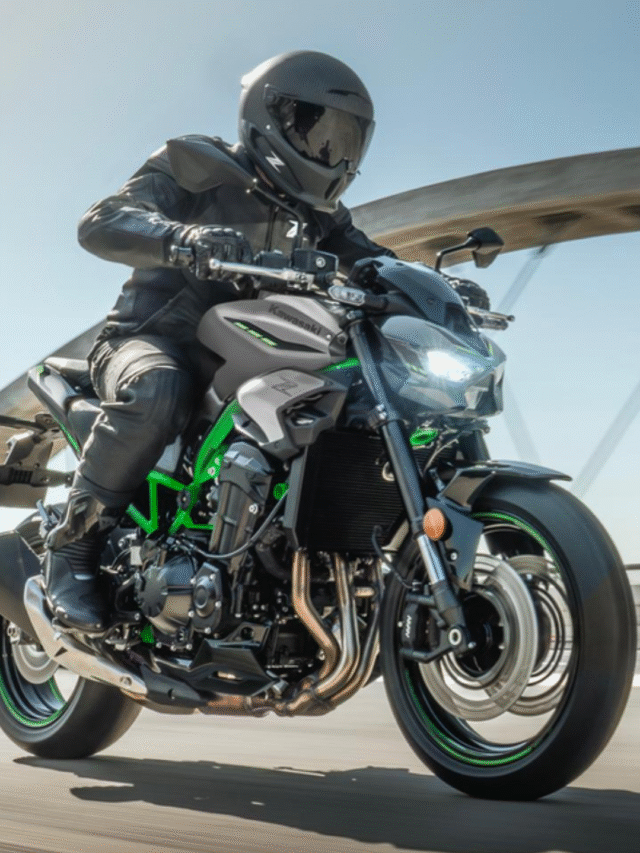 2025 Kawasaki Z900 front view showcasing aggressive streetfighter design in urban environment